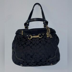 Coach black handbag with gold hardware. 3 charms. Rare. Black Designer Handbag.